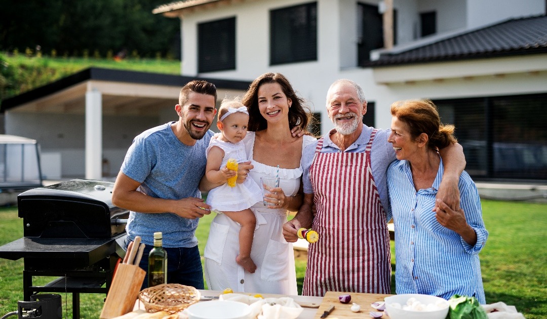 portrait-of-multigeneration-family-outdoors-on-gar-2021-08-27-16-20-05-utc-1