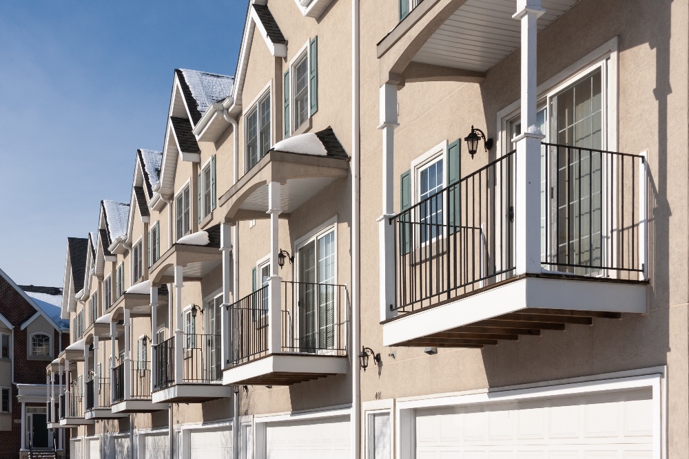 row-of-apartment-condominiums-balconies-and-garage-2022-10-17-01-18-12-utc-1